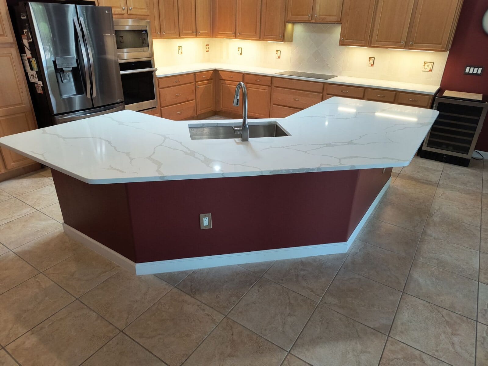 a kitchen remodeling in tucson with a marble island